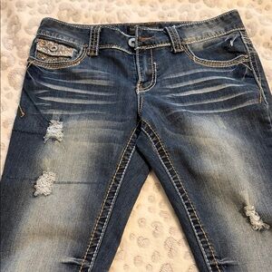 Women’s Distressed Mid-Rise Skinny Jeans in Dark Blue